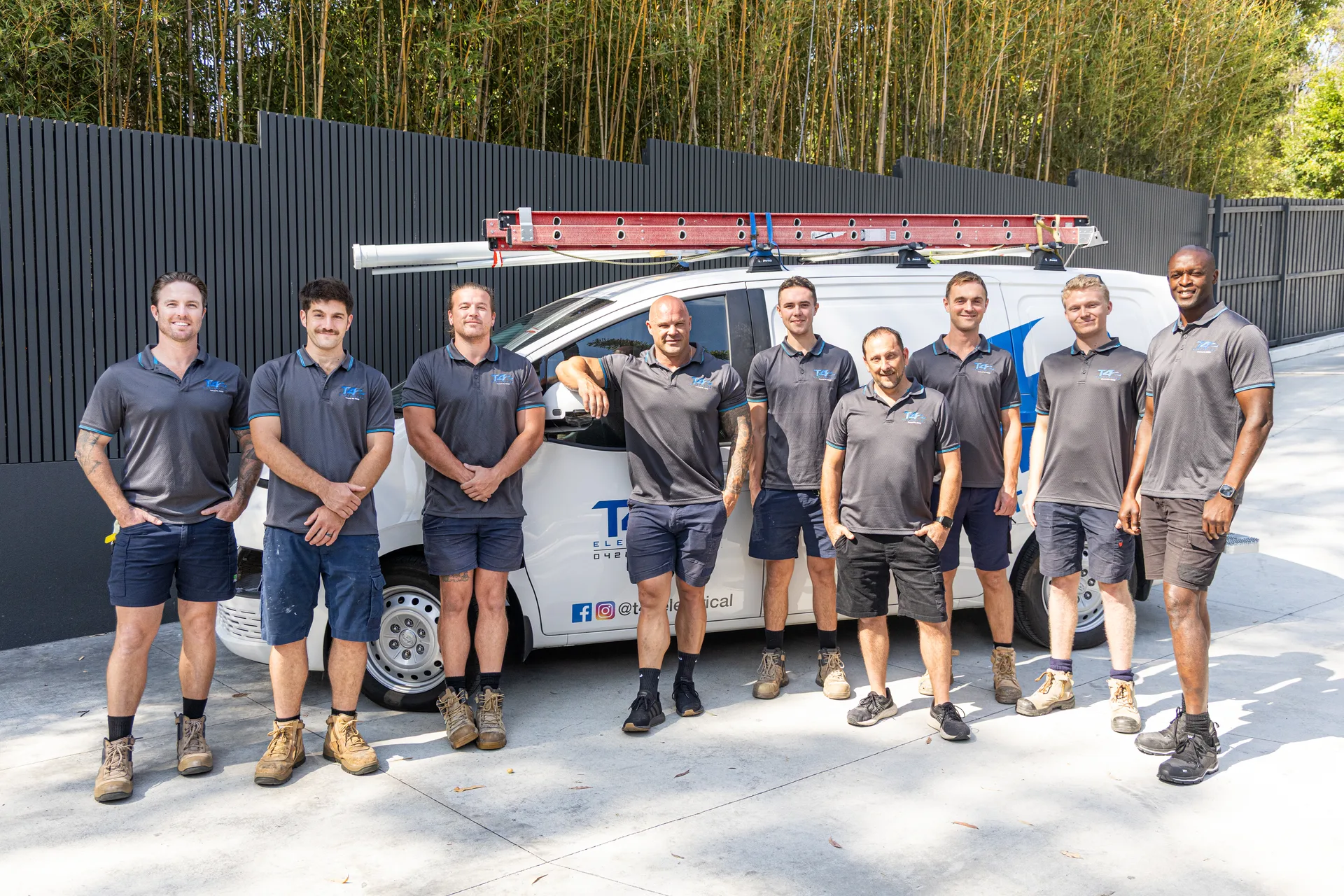 The Family Electrician Biggera Waters team with a service van